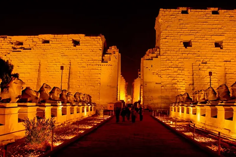 The avenue of ram-headed sphinxes at Karnak, lit at night