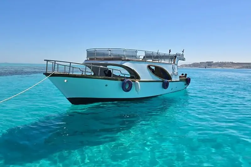 A boat on turquoise water near Hurghada
